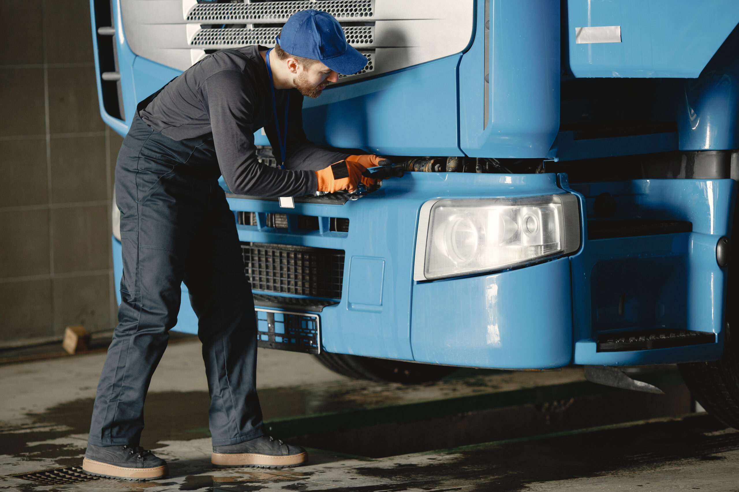 worker checks the quality of the wheel